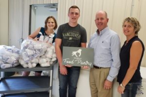 Peoples Bank & Trust presents donation to Taylorville Food Pantry