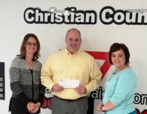 Peoples Bank & Trust recently contributed $12,000 to the Christian County YMCA