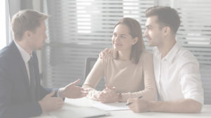 Young couple meeting with bank employee