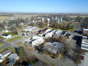 Drone image of town with watertower