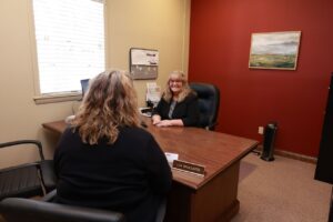 Lisa McCallister Meeting with client in her office